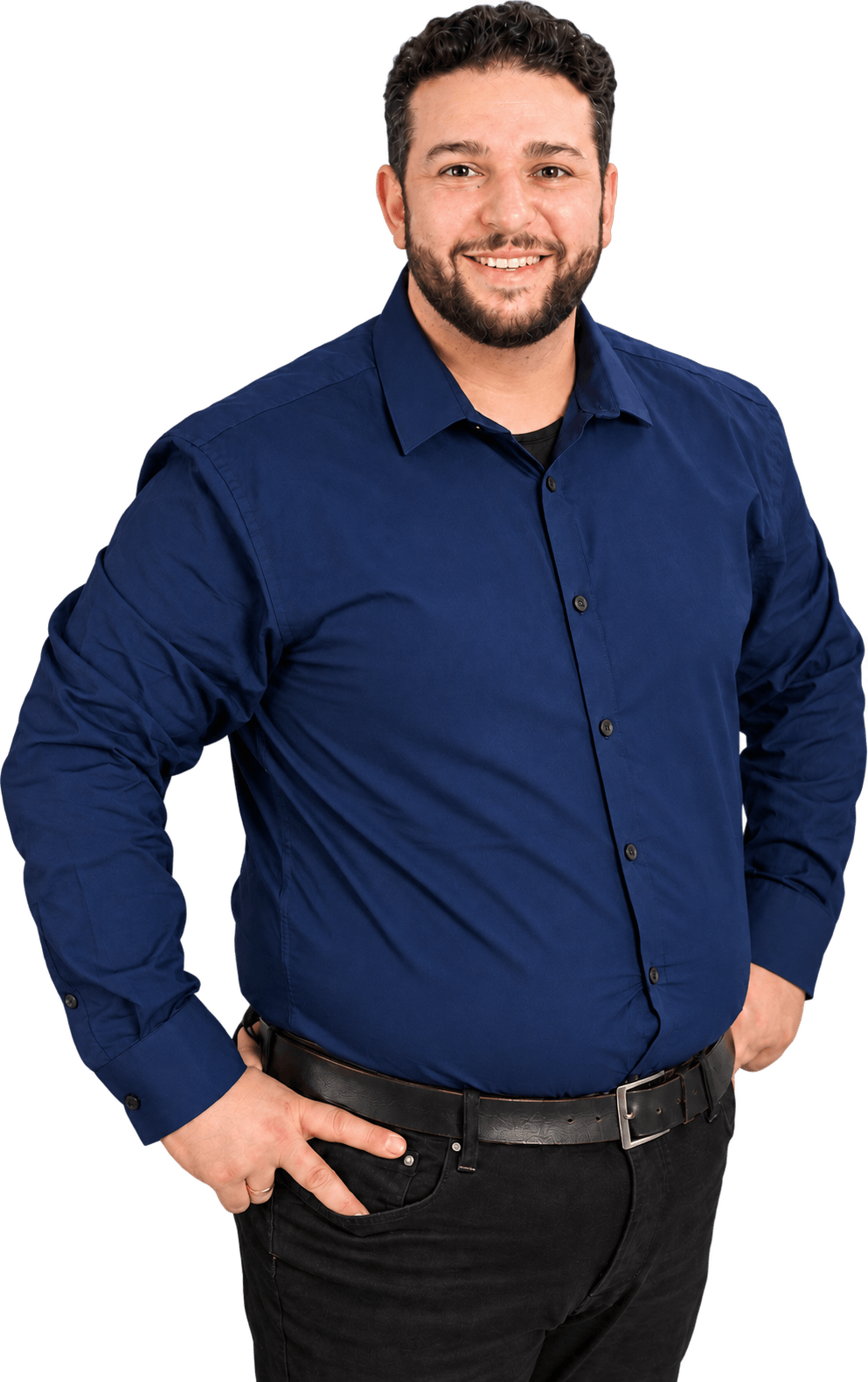 Marc Ermagan van Ermax Media, in een donkerblauw overhemd, lachend in de camera.